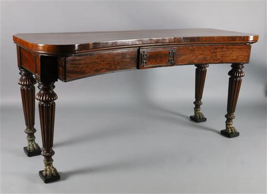 A Regency mahogany concave serving table, W.6ft 3in. D.2ft 3.5in. H.3ft